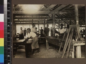Students inside carpentry shop, Beru, Kiribati, 1913-1914