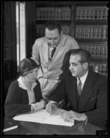 Emma Gloeckner, C. Lloyd Fisher, and Vincent A. Marco discuss Bruno Hauptmann's case, Hollywood, 1935