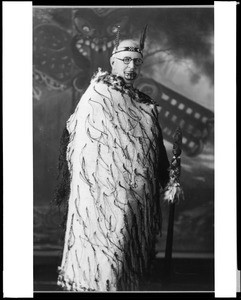 Portrait of a man identified as "Uncle Erreld" in Maori costume, Rotorua, New Zealand, 1934