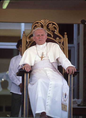 Pope John Paul II sits on a gilded throne, Managua, Nicaragua, 1983