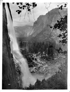 Yosemite Falls and the valley behind in Yosemite National Park, ca.1900-1930
