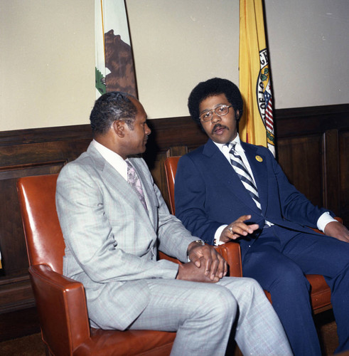 John Floyd talking with Tom Bradley, Los Angeles, 1974