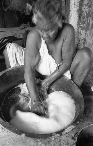 Woman washing clothes, San Basilio de Palenque, 1977