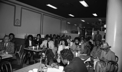 Participants listening to speakers during a Crenshaw Area Commercial Merchants Workshop, Los Angeles, 1982