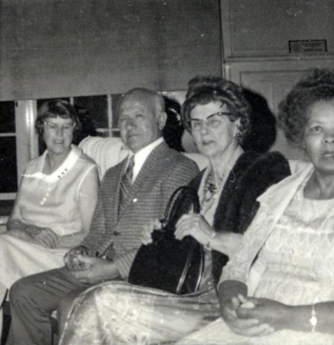 Three women and a man sitting at the 1973 YWCA annual meeting