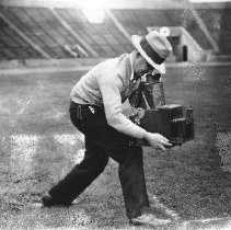 Photographer in Hughes Stadium