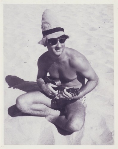 E. J. Oshier playing ukulele at Cowell Beach