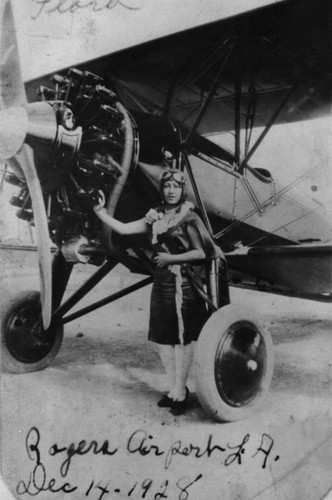 Woman with airplane