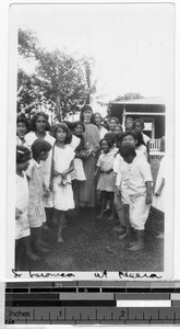 Sister Veronica Hartman, MM, with children, Heeia, Hawaii, 1930