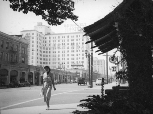 Woman strolls on Hollywood Boulevard