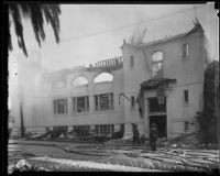 Firefighters after the fire destroying the First Baptist Church of Hollywood, Hollywood, 1935