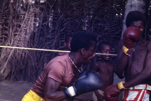 Men boxing in boxing ring, San Basilio de Palenque, 1976