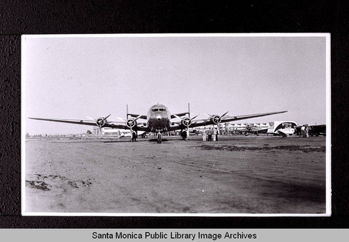 Super DC-3 at Clover Field Airport, Santa Monica, Calif. with Redman Moving & Storage van