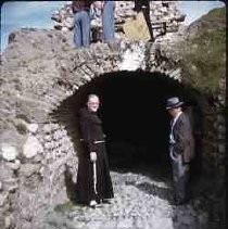 Slides of California Historical Sites. Father Alfred Boedecker, George Dyson, and Keith Dyson at Mill, San Antonio de Padua Mission, Jolon, Calif. March 26, 1955