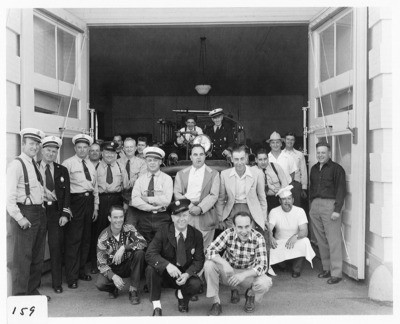 Fire Department - Stockton: Fireman group posed in front of engine