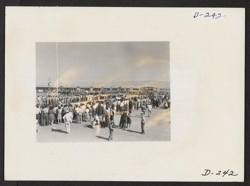 A panorama view showing the tremendous crowd which participated in the Labor Day celebration at this relocation center. Evacuee leaders as well as Caucasian administrators addressed the enthusiastic crowds. Photographer: Stewart, Francis Newell, California