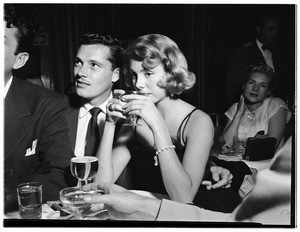 Nick Hilton and fiance at the Mocambo night club, 1951