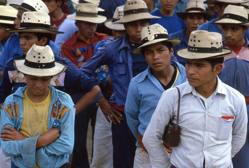 Mayan men standing in line to vote, Chajul, 1982