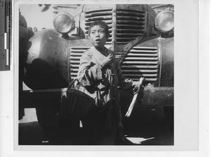 A beggar boy at Wuzhou, China, 1949