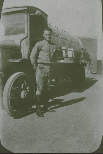 Marquez gas station attendant with a gasoline delivery truck in Santa Monica Canyon