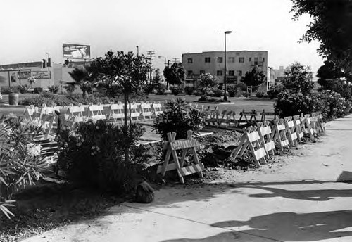 Photograph taken of parking lot number two on Main Street, sectioned off with barricades