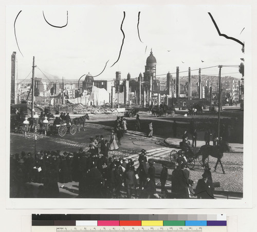 [Street scene, Van Ness Ave. Relief line in foreground? City Hall in background.]