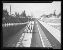 Motorcade led by motorcycles during the dedication of Arroyo Seco Parkway, Los Angeles, 1940