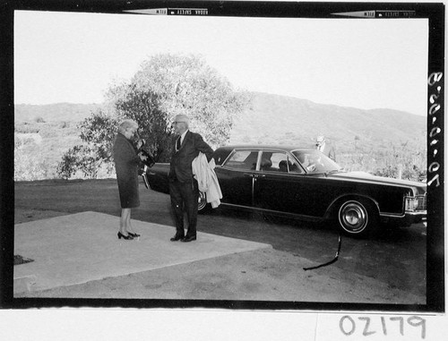 Lee A. Dubridge and Mrs. Dubridge arriving at the dedication of the 60-inch telescope, Palomar Observatory