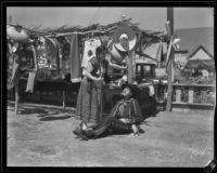 Man and woman in Spanish dress at the Old Spanish Days Fiesta, Santa Barbara, 1932