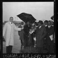 President Maurice Yaméogo of Upper Volta and wife being greeted at Los Angeles airport by Walter Coombs, 1965