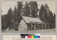 View of Whitaker's camp headquarters from the southeast. It is largely constructed of Bigtree lumber with cedar shingle roof and white fir shake sides. Metcalf. July, 1928