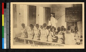 Missionary sister teaching rows of young girls, Congo, ca.1920-1940
