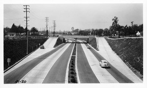 View along the Arroyo Seco Parkway, State Route 205, looking west at Orange Grove Avenue ramps from Prospect Avenue bridge, Los Angeles County, 1941