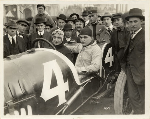 [Eddie Pullen sitting behind the wheel of a race car at the Panama-Pacific International Exposition]
