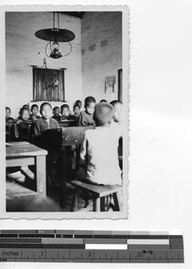 Boys in a doctrine classroom at Luoding, China, 1937