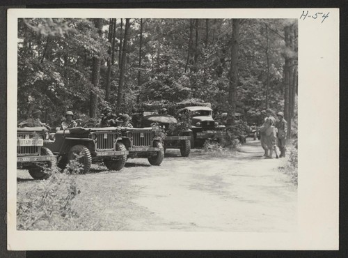 A motorized convoy awaiting orders to advance. The 442nd combat team at Camp Shelby is composed entirely of Americans of