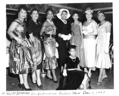 Rhododendron Club fashion show contestants posing at Slim Jenkins