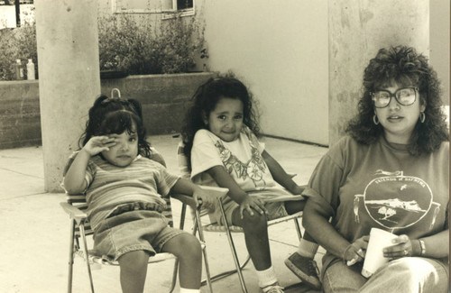 Two Chumash sisters sit side-by-side, early 1990s