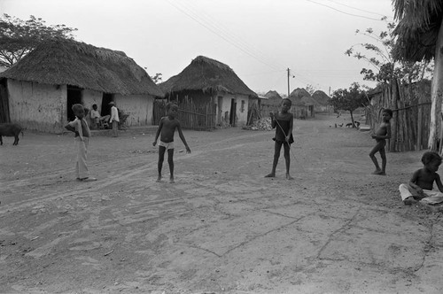 Children playing hopscotch on the street, San Basilio de Palenque, 1977