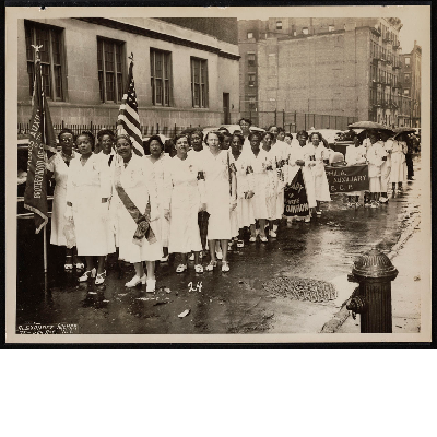 Ladies Auxiliary to the Brotherhood of Sleeping Car Porters marching in parade