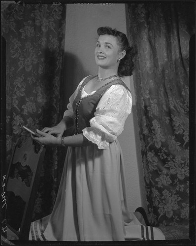 Mezzo soprano June Moss in a dirndl costume for the opera Martha, Santa Monica, circa 1956