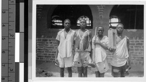 Four boys holding tools to make bricks, Africa, 1947