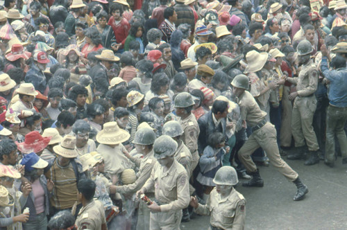 Crowd control at the Blacks and Whites Carnival, Nariño, Colombia, 1979