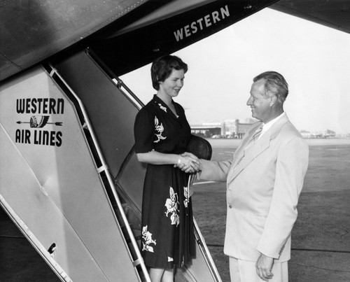 1940s - Dianna Cyrus, Woman Flyer, Greeted by Howard I. Stites, City Manager of Burbank