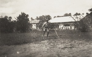 Epugo cutting grass, Nigeria, ca. 1934