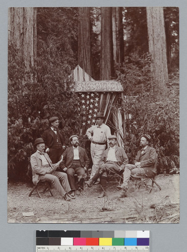Group portrait of six men by tent with sign above door "Salaam ie Hogir," Bohemian Grove. [photographic print]