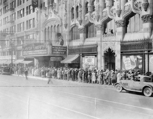United Artists Theater showing of "Woman Disputed"