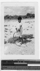 Rolando with hoop, Carrillo Puerto, Quintana Roo, Mexico, ca. 1947