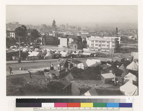Camp on 15 [Fifteenth] & Market. [Fairmont Hotel in distance, left; City Hall in distance, left center.]
