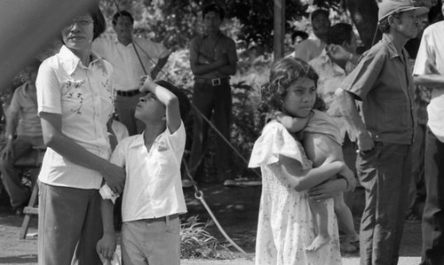 People look on as celebration for Sandinista victory ensues, Managua, 1979